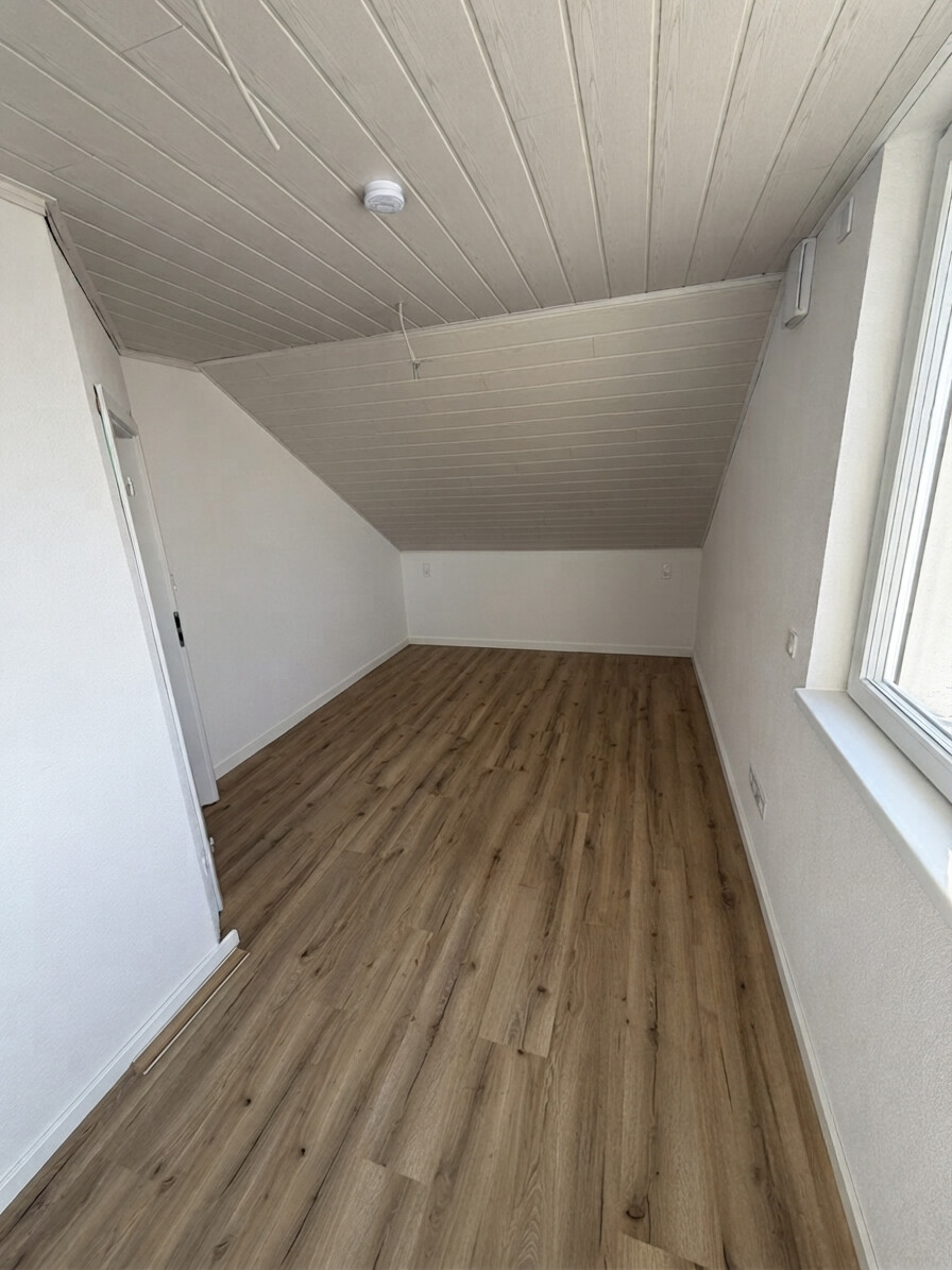 Schlafzimmer Dachgeschosswohnung Schefflenz / Oberschefflenz