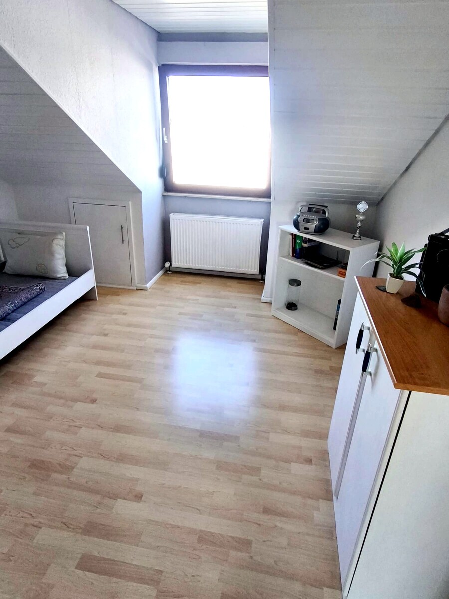 Schlafzimmer Dachgeschosswohnung Bad Friedrichshall